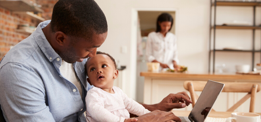 Dad and baby on computer